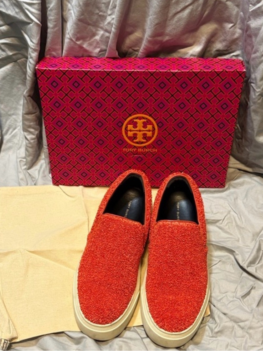 New Tory Burch Ladybug slip-on sneakers in a bright orange textured
Size 8